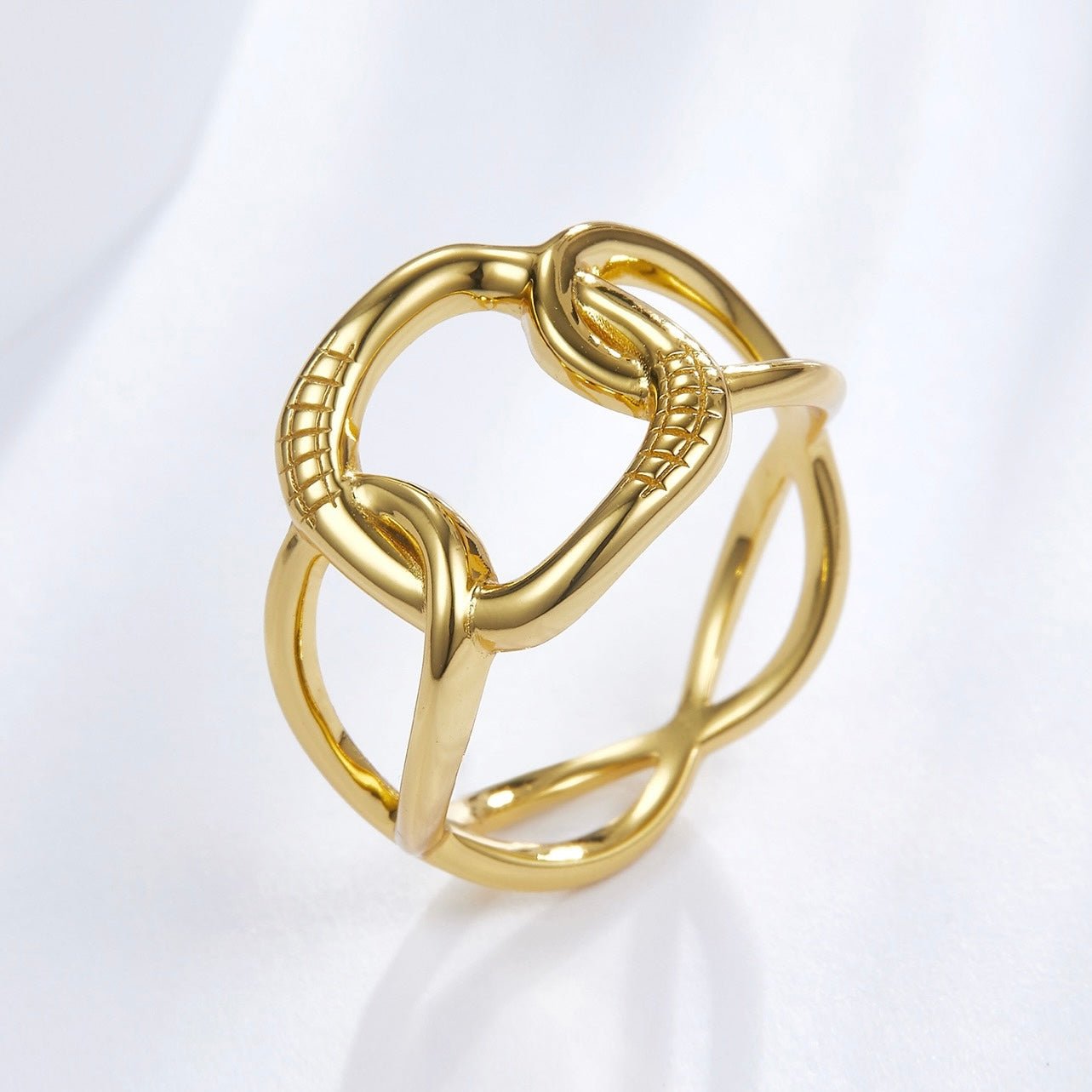 Macro angle detail view of The Halo Ring showing its bold open-loop structure and 18ct gold vermeil finish by Awakened Time.