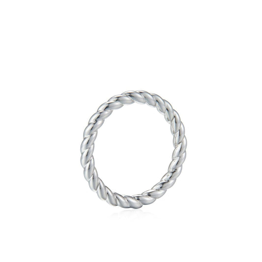 Awakened Time Léa Twist luxury ring in a clean studio product shot, showcasing its polished braided rope design crafted in 18ct recycled white gold plating.
