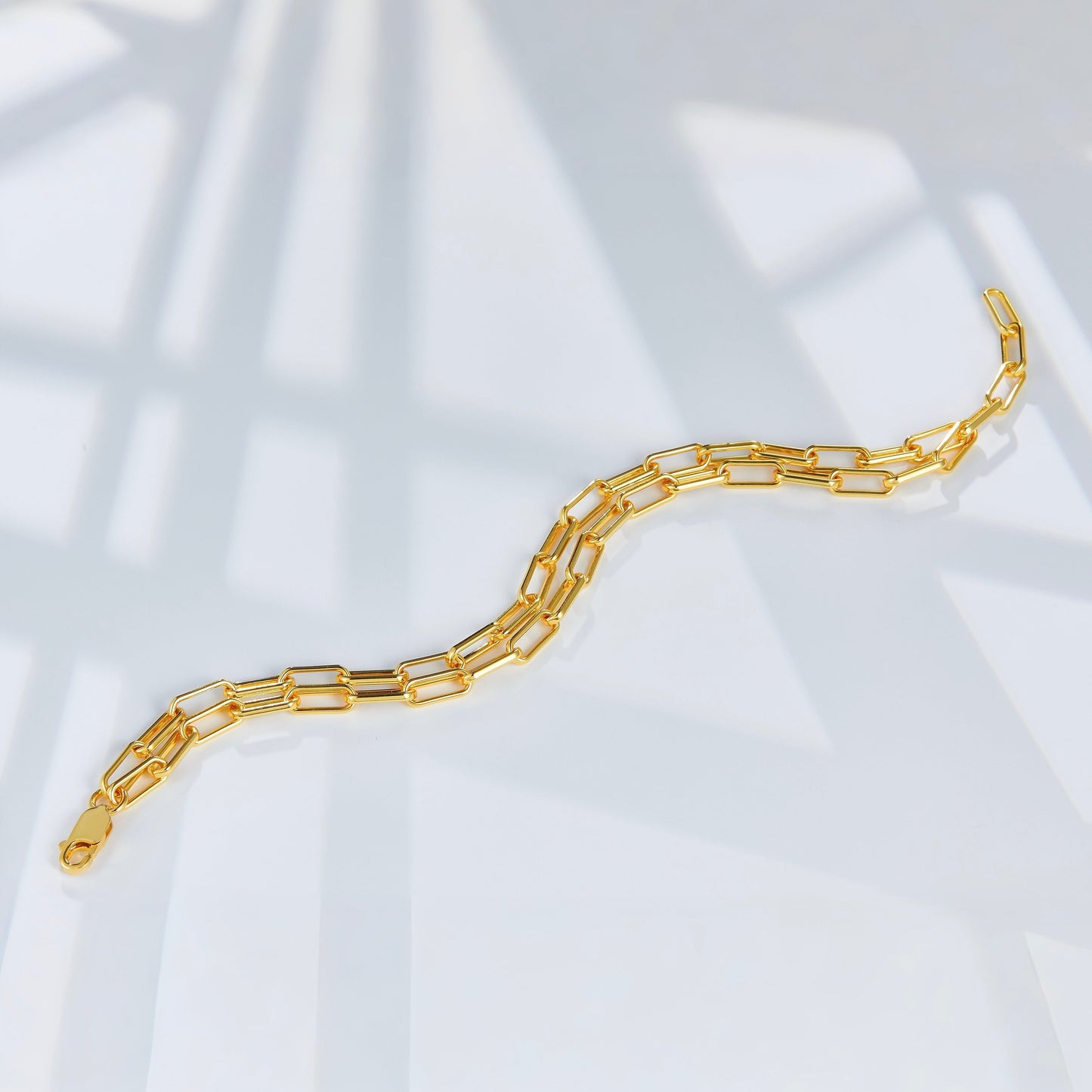 Auréole Double Paperclip Bracelet by Awakened Time showcasing a modern double paperclip chain design crafted in 18ct gold vermeil over 925 sterling silver.