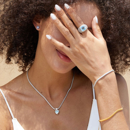 Woman wearing the Awakened Time Bare Luxe Essential Chain Bracelet, a minimalist chain bracelet designed for effortless everyday jewelry styling.