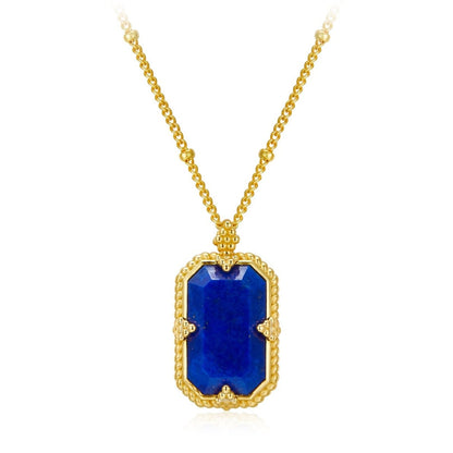 Awakened Time Bleu Nuit pendant necklace in 18ct gold vermeil featuring a step-cut natural lapis lazuli in a beaded gold setting.