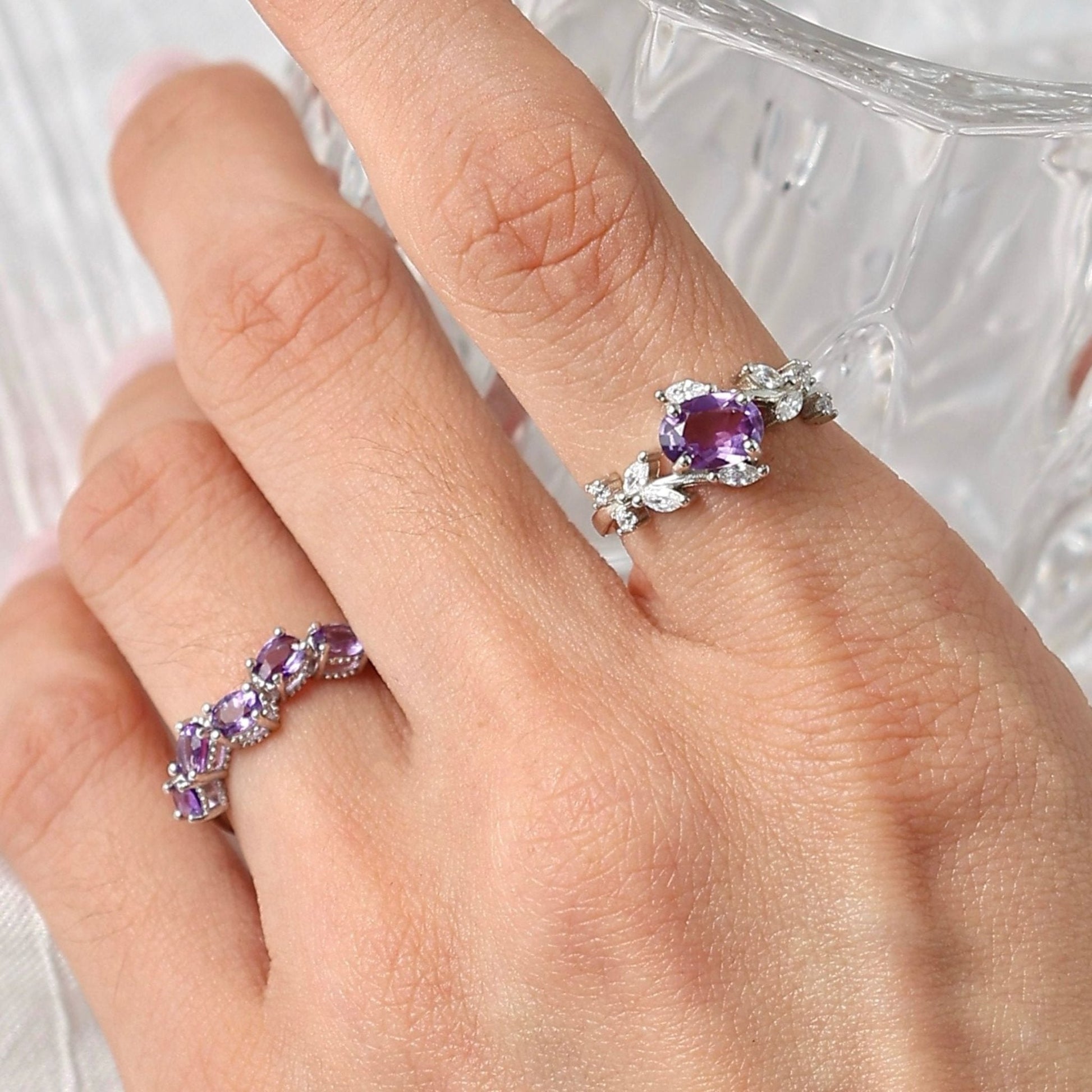 Awakened Time Floral Ring featuring a natural amethyst gemstone in a delicate floral-inspired 925 sterling silver setting with sparkling cubic zirconia accents.
