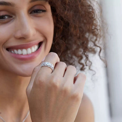 Florentine Lace Ring by Awakened Time featuring natural blue topaz gemstone, worn elegantly as a timeless women's luxury jewelry piece.