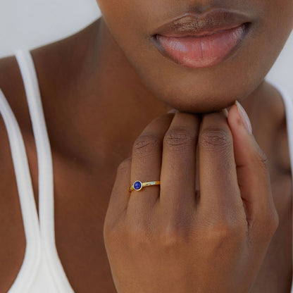 Handcrafted 18ct gold vermeil and lapis lazuli gemstone ring by Awakened Time, styled as luxury everyday jewelry for modern elegance.