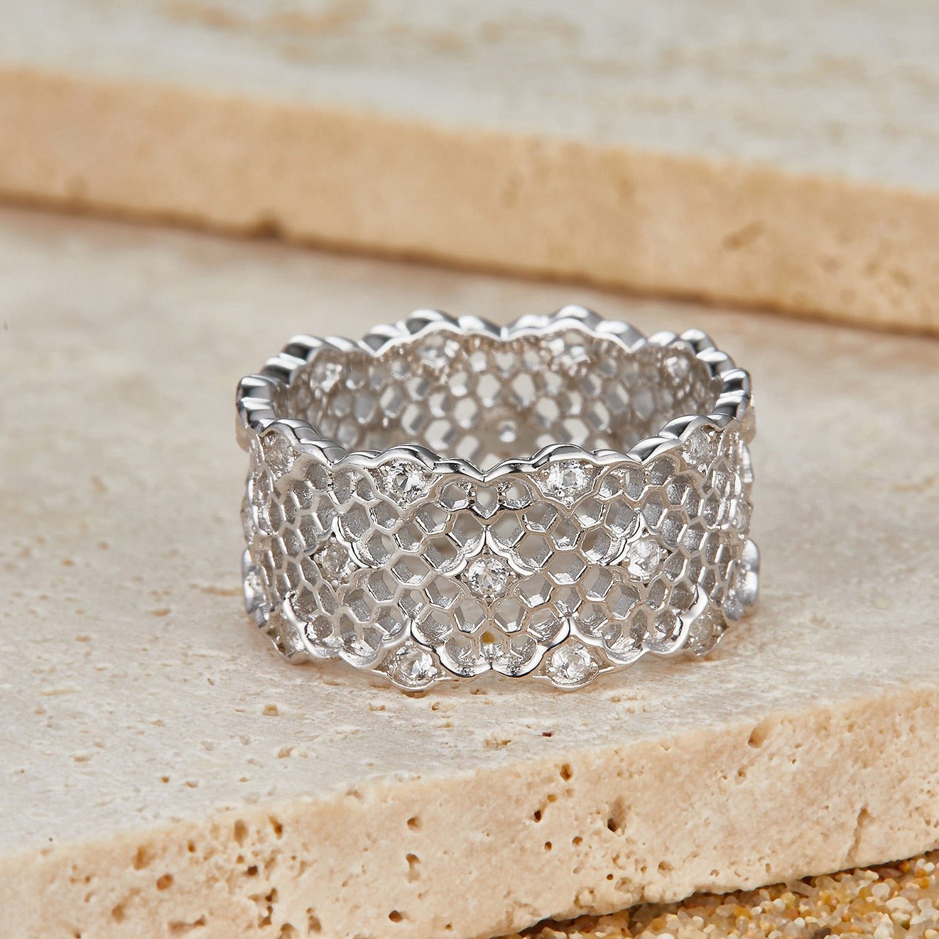 Awakened Time Iceveil Wide Band Ring featuring an intricate honeycomb lattice design with 5A cubic zirconia accents in 18ct recycled white gold vermeil over 925 sterling silver.