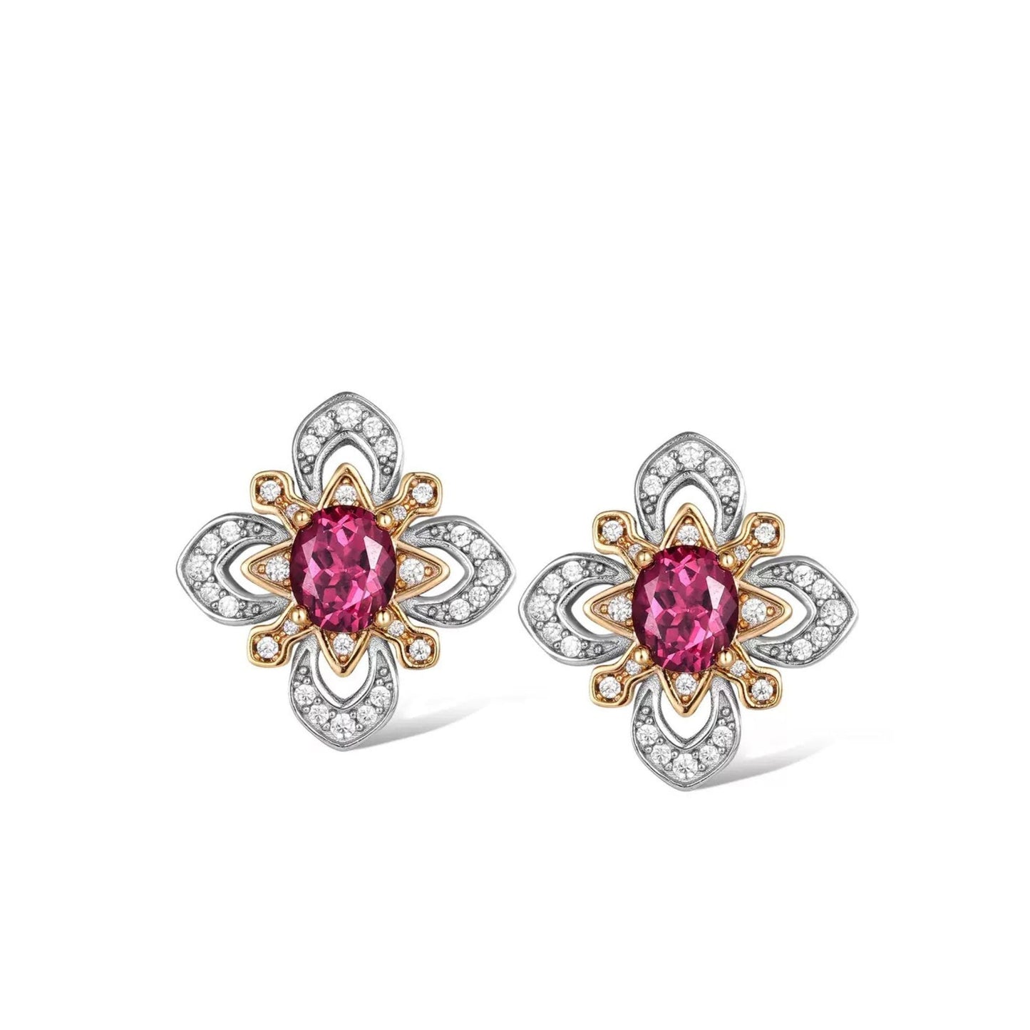 Pair of Awakened Time La Rosa di Firenze two-tone stud earrings featuring oval red garnets encircled by gold petal frames and silver pavé zirconia borders on a white background.
