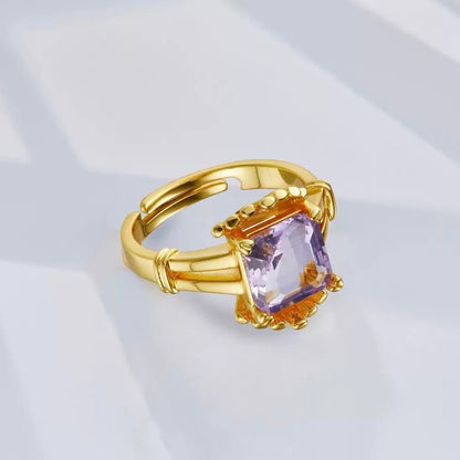 Angled studio view of The Lilac Crown Ring highlighting its adjustable crown-like architecture and gold vermeil finish by Awakened Time.