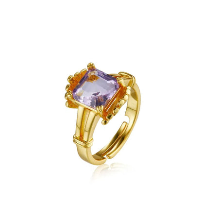 Studio product shot of The Lilac Crown Ring by Awakened Time featuring a natural amethyst set in an 18ct gold vermeil adjustable band.