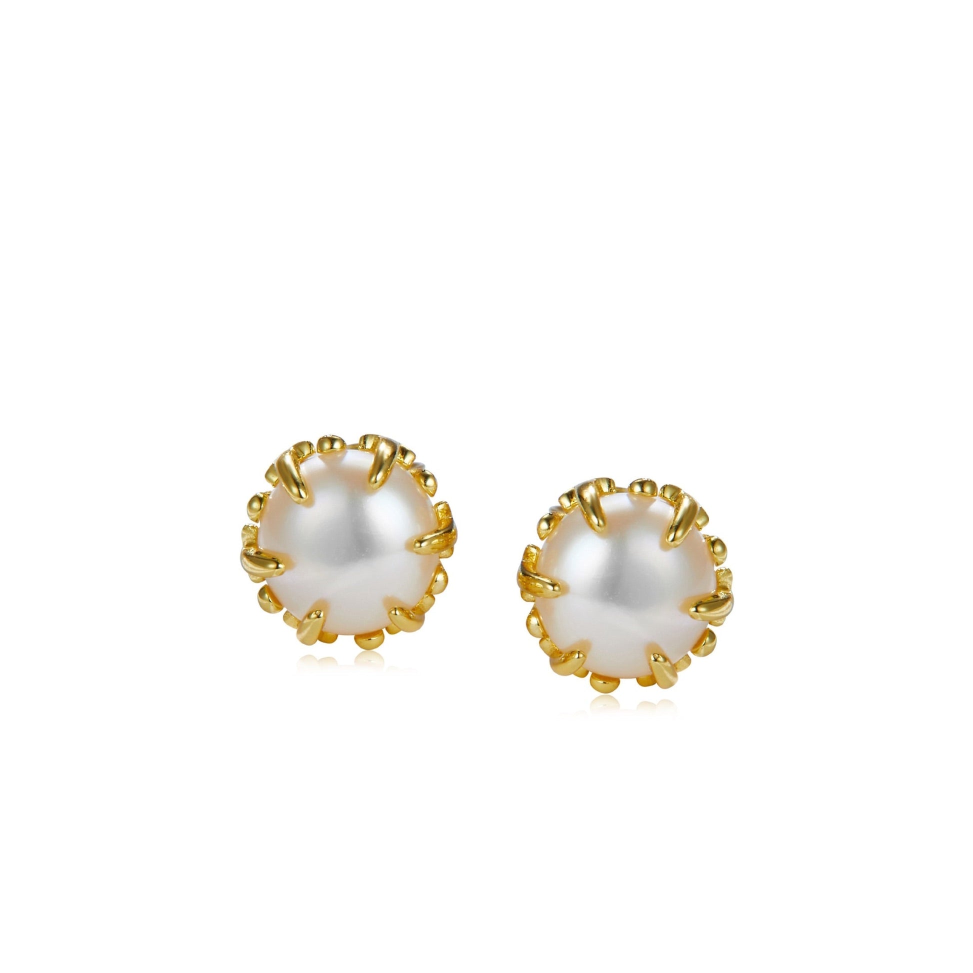 Pair of Awakened Time Lustre stud earrings featuring natural white freshwater pearls cradled by intricate organic gold claw prongs on a plain white background.