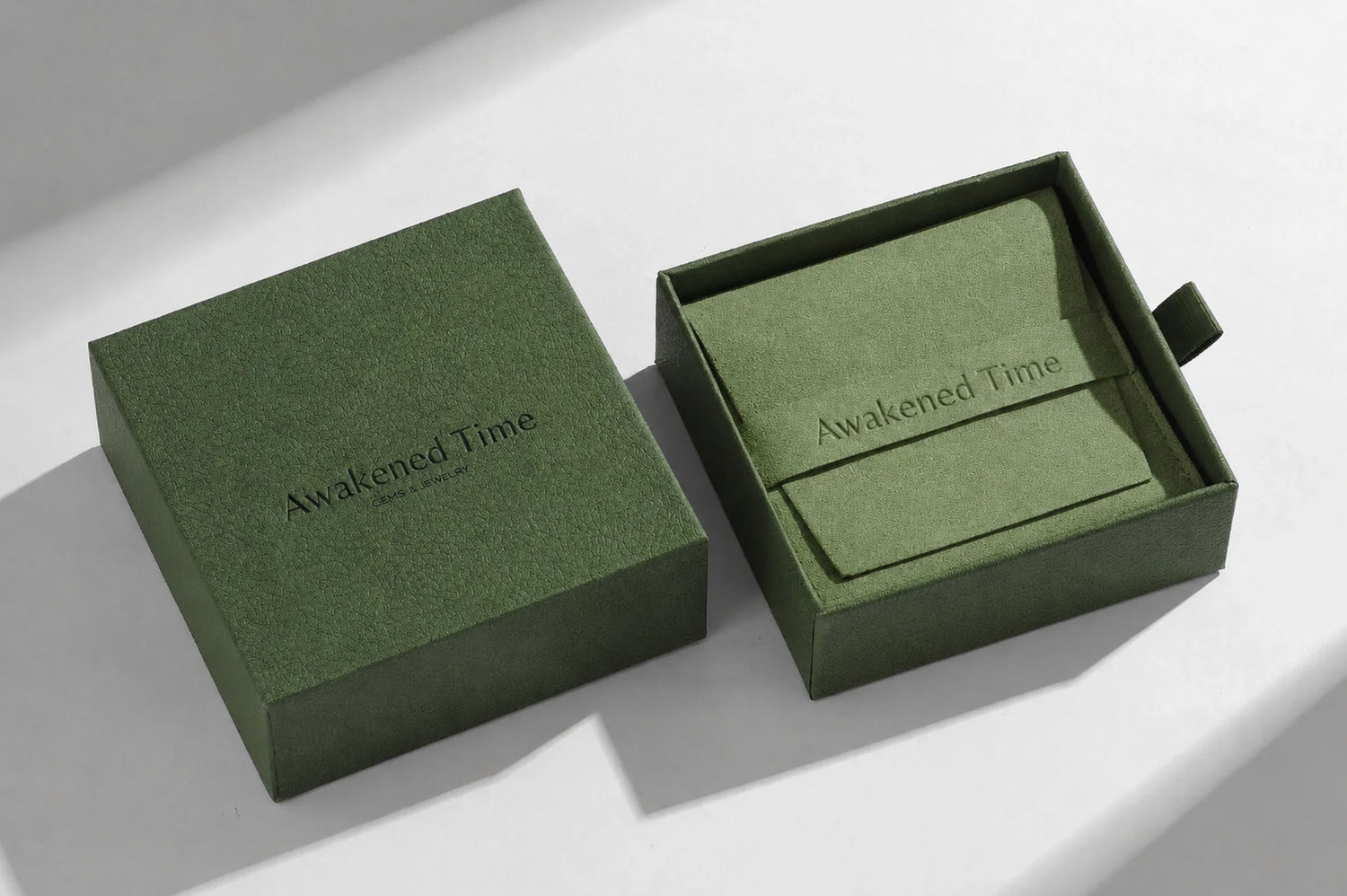 Awakened Time luxury jewelry packaging box in olive green with elegant gift presentation.