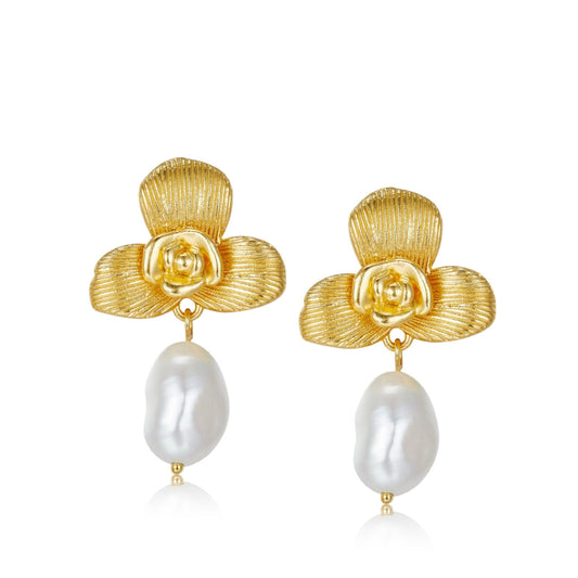 Pair of Awakened Time gold sculpted orchid drop earrings featuring baroque freshwater pearl drops on a white background.