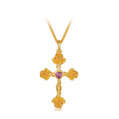 Awakened Time 18k gold vermeil Rosevine Cross Necklace with a central heart-shaped red garnet on a white background.