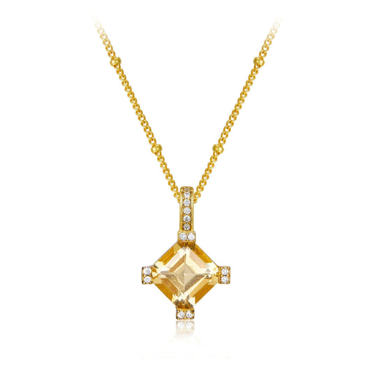 Awakened Time Stellar Frame necklace in 18ct gold vermeil featuring a princess-cut yellow citrine gemstone surrounded by diamond-pave accents on a white background.