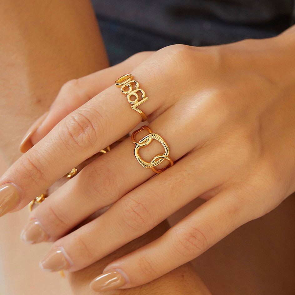 Close-up shot of a model's hand wearing The Halo Ring by Awakened Time, styled as luxury 18ct gold vermeil everyday jewelry.