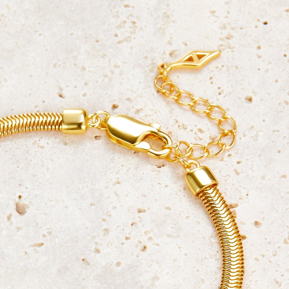 Close-view of the Awakened Time Bare Luxe Essential Chain Bracelet crafted in 925 sterling silver with a durable 18ct recycled gold vermeil finish.