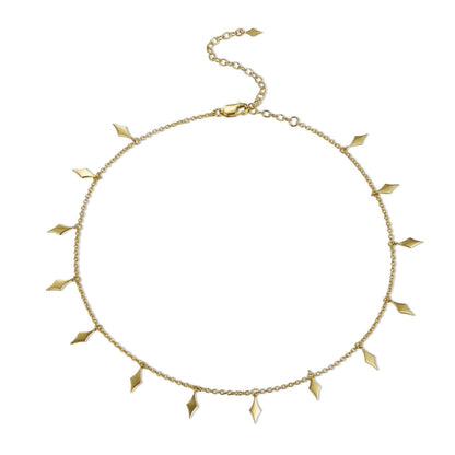 Flat lay view of the Bare Luxe Venus Drip gold necklace showing the chain loop and extender clasp