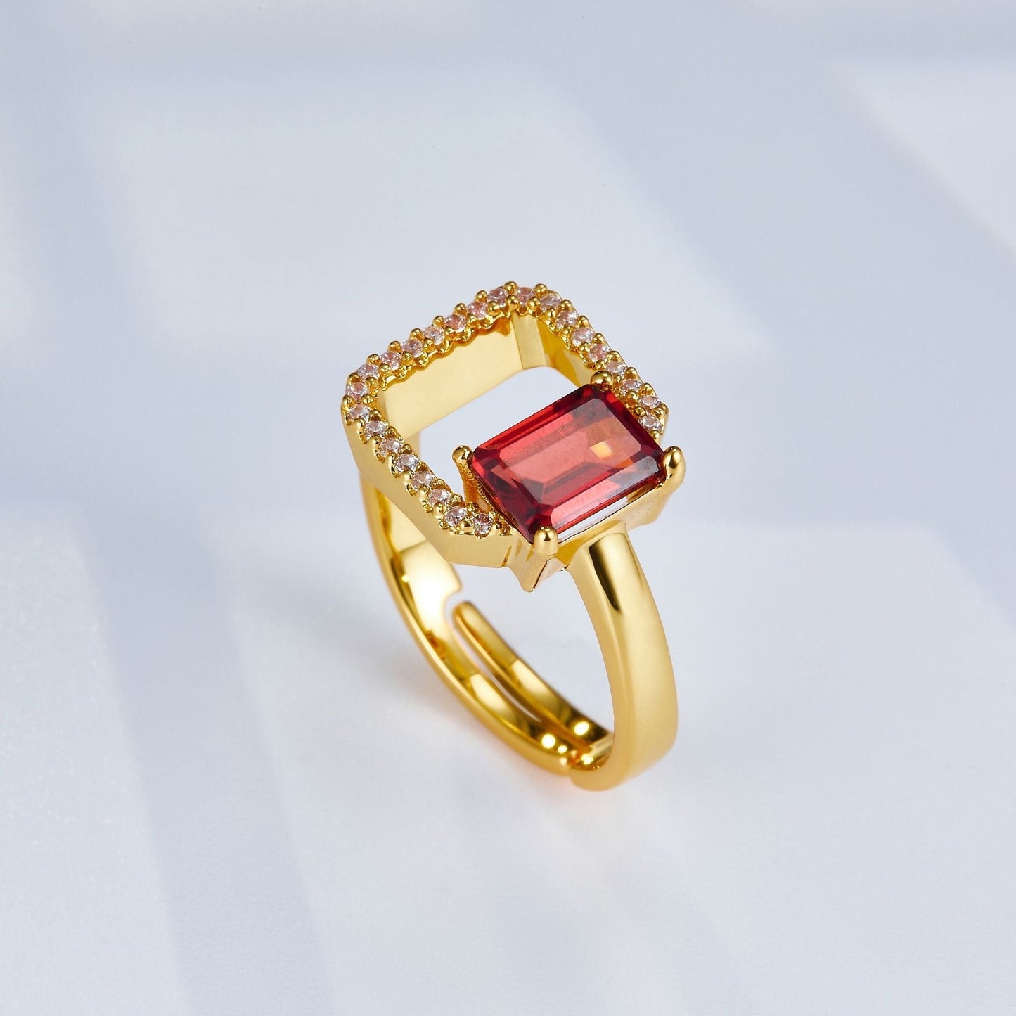 Carré Rouge square garnet ring with geometric frame design, crafted in 925 sterling silver with recycled gold vermeil finish.