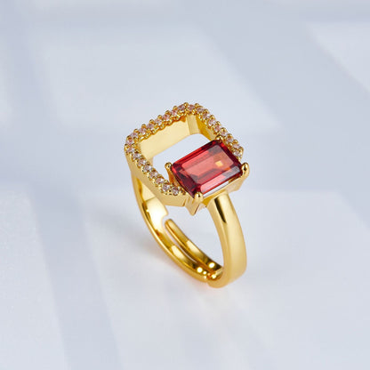 Carré Rouge square garnet ring with geometric frame design, crafted in 925 sterling silver with recycled gold vermeil finish.