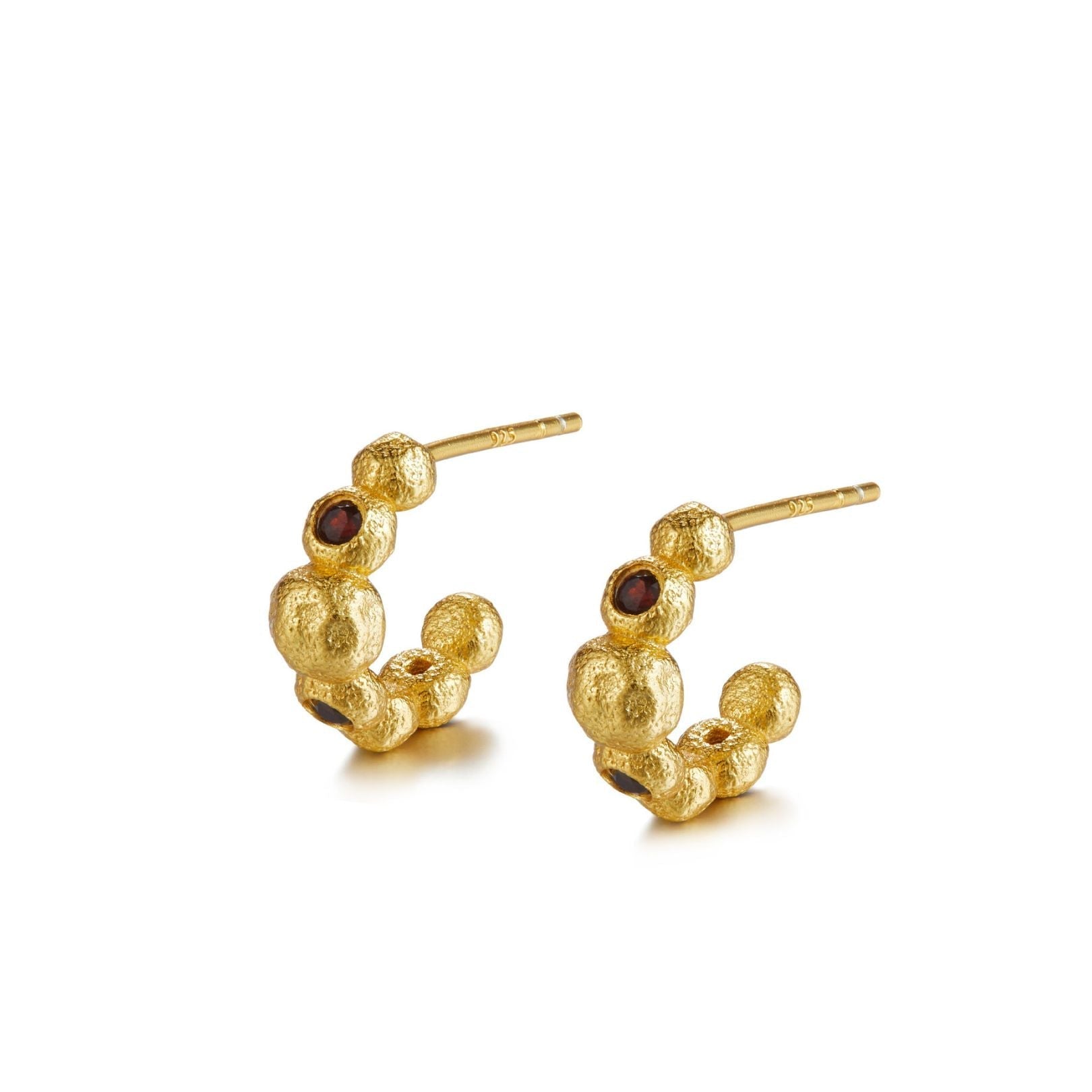Pair of Crimson Tide Huggie Earrings in textured 18k gold vermeil set with natural round red garnet stones.