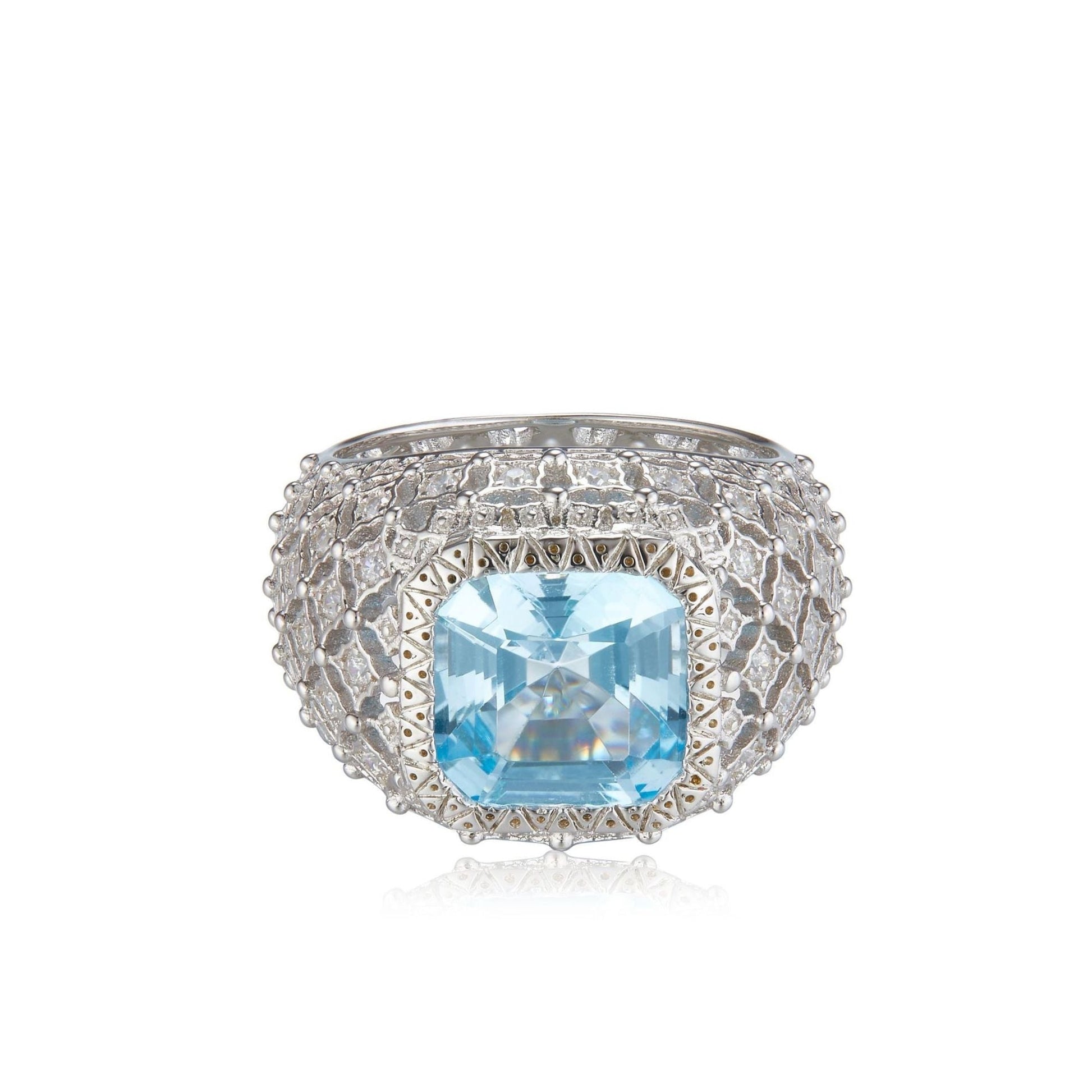 Awakened Time Glacier Crown Ring featuring a radiant natural blue topaz center stone set in 18ct white gold vermeil with an intricate sculpted crown design.