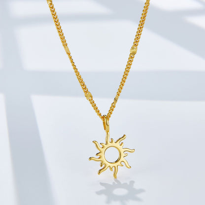 Full view of the Helia gold vermeil sunburst pendant necklace on a clean white surface