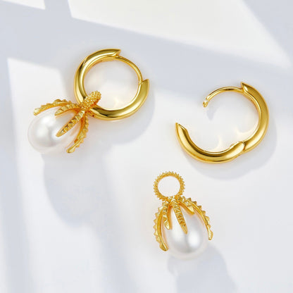 Awakened Time Jardin Secret gold huggie hoop earrings shown open alongside a detachable pearl vine charm on a bright background.
