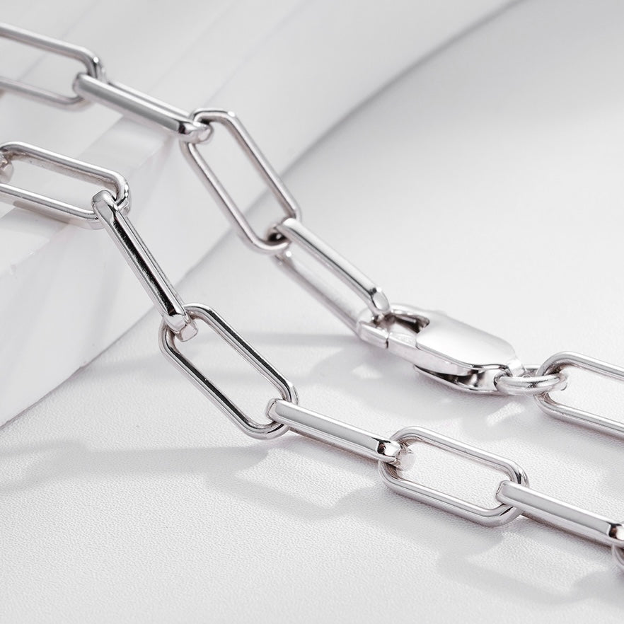 Close-up of white gold vermeil paperclip necklace links