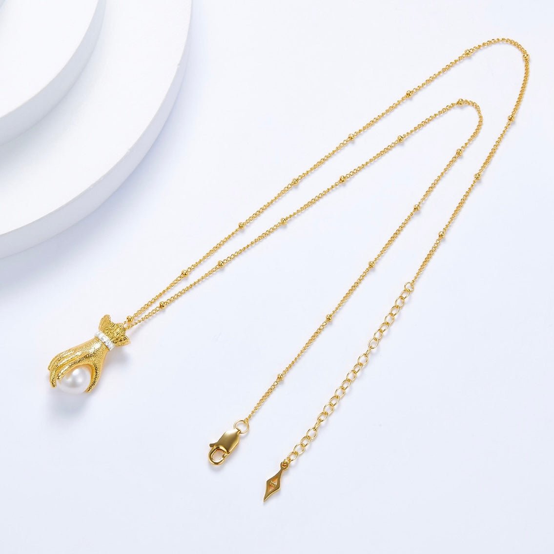 Collier Pearl in Palm