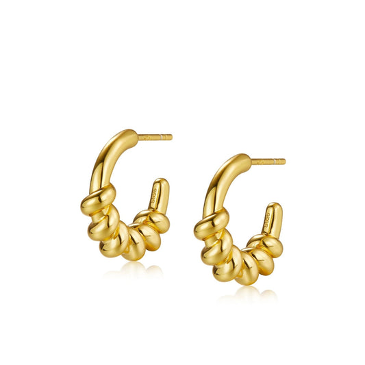 Pair of Roma Twist Hoop Earrings in 18k gold vermeil showing a sculptural rope-like twisted spiral design.